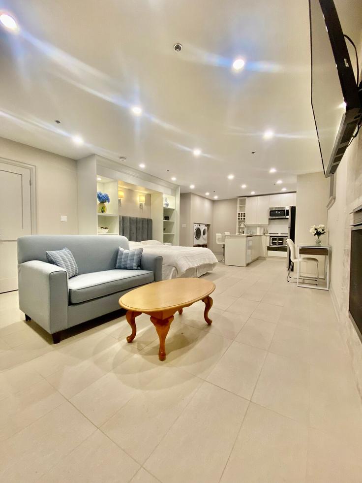 Salle de séjour élégante avec mobilier moderne dans un appartement à Building Bolingbroke Road - 2574902-ontario-inc - 1513095 à North York, Toronto Salle de séjour élégante avec mobilier moderne dans un appartement à Building Bolingbroke Road - 2574902-ontario-inc - 1513095 à North York, Toronto