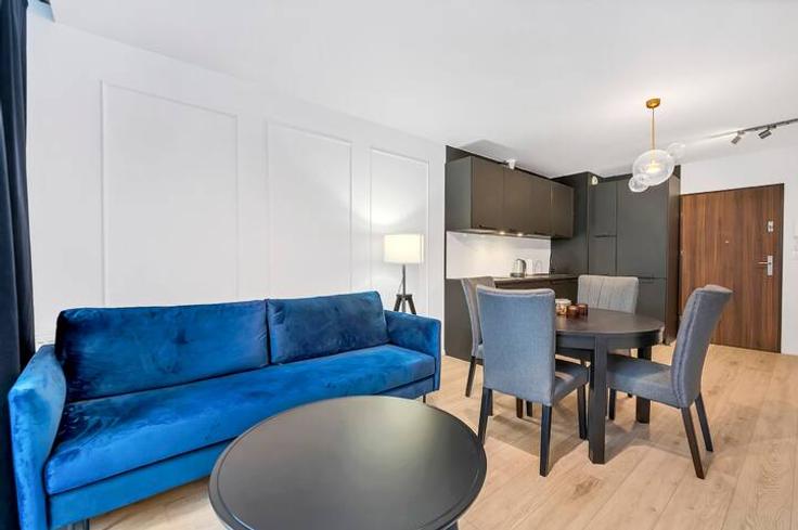 Salle de séjour élégante avec mobilier moderne dans un appartement à Building Jagienki - 7252289759 - 1465745 à Łódź, Łódź Salle de séjour élégante avec mobilier moderne dans un appartement à Building Jagienki - 7252289759 - 1465745 à Łódź, Łódź