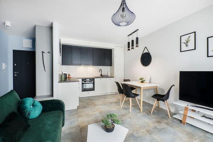 Salle de séjour élégante avec mobilier moderne dans un appartement à Building Drewnowska - 7252289759 - 1465753 à Łódź, Łódź Salle de séjour élégante avec mobilier moderne dans un appartement à Building Drewnowska - 7252289759 - 1465753 à Łódź, Łódź