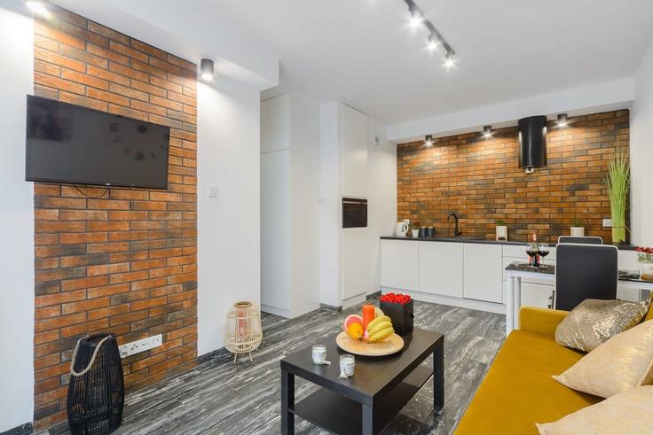 Salle de séjour élégante avec mobilier moderne dans un appartement à Building Drewnowska - 7252289759 - 1465715 à Łódź, Łódź Salle de séjour élégante avec mobilier moderne dans un appartement à Building Drewnowska - 7252289759 - 1465715 à Łódź, Łódź