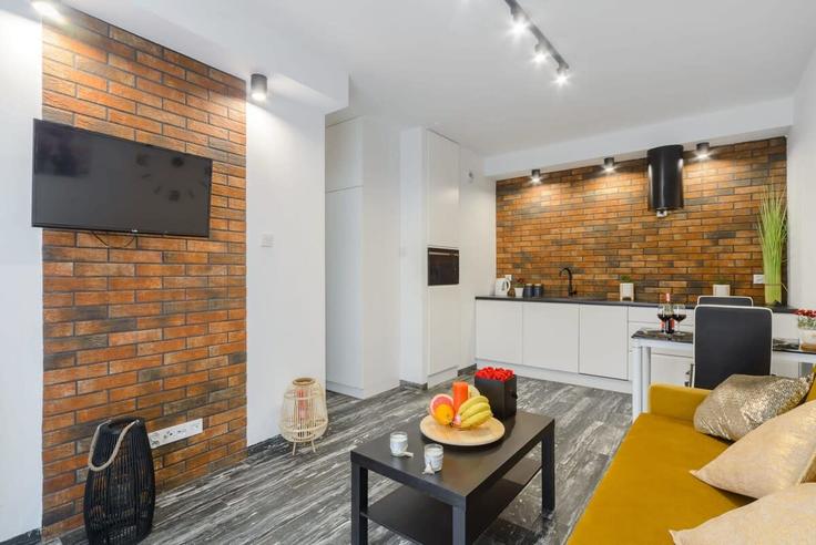 Salle de séjour élégante avec mobilier moderne dans un appartement à Building Drewnowska - 7252289759 - 1397121 à Łódź, Łódź Salle de séjour élégante avec mobilier moderne dans un appartement à Building Drewnowska - 7252289759 - 1397121 à Łódź, Łódź