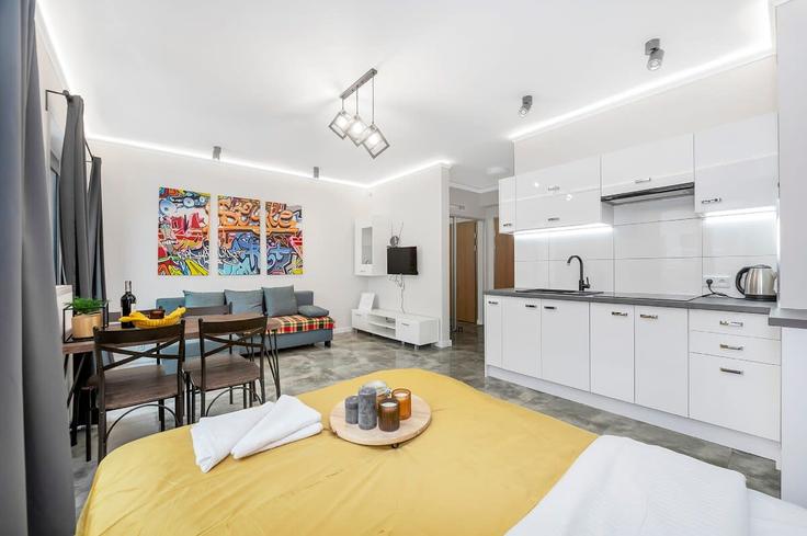 Elegant gestaltetes Wohnzimmer mit moderner Einrichtung in einer Wohnung im Building Prezydenta Gabriela Narutowicza - 7252289759 - 1391847 in Łódź, Łódź Elegant gestaltetes Wohnzimmer mit moderner Einrichtung in einer Wohnung im Building Prezydenta Gabriela Narutowicza - 7252289759 - 1391847 in Łódź, Łódź