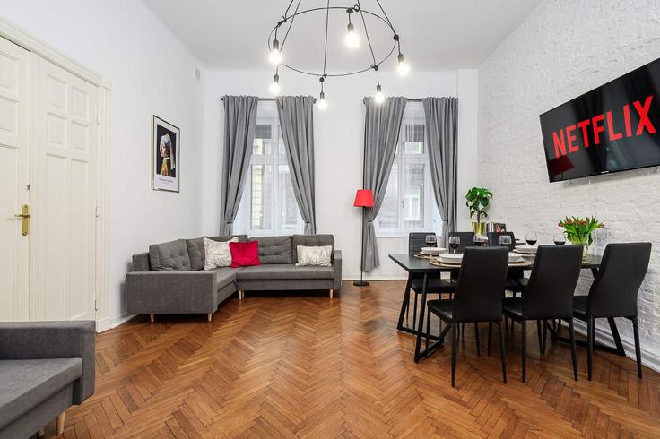Elegant gestaltetes Wohnzimmer mit moderner Einrichtung in einer Wohnung im Building Grzegorza Piramowicza - 7252289759 - 1397102 in Łódź, Łódź Elegant gestaltetes Wohnzimmer mit moderner Einrichtung in einer Wohnung im Building Grzegorza Piramowicza - 7252289759 - 1397102 in Łódź, Łódź