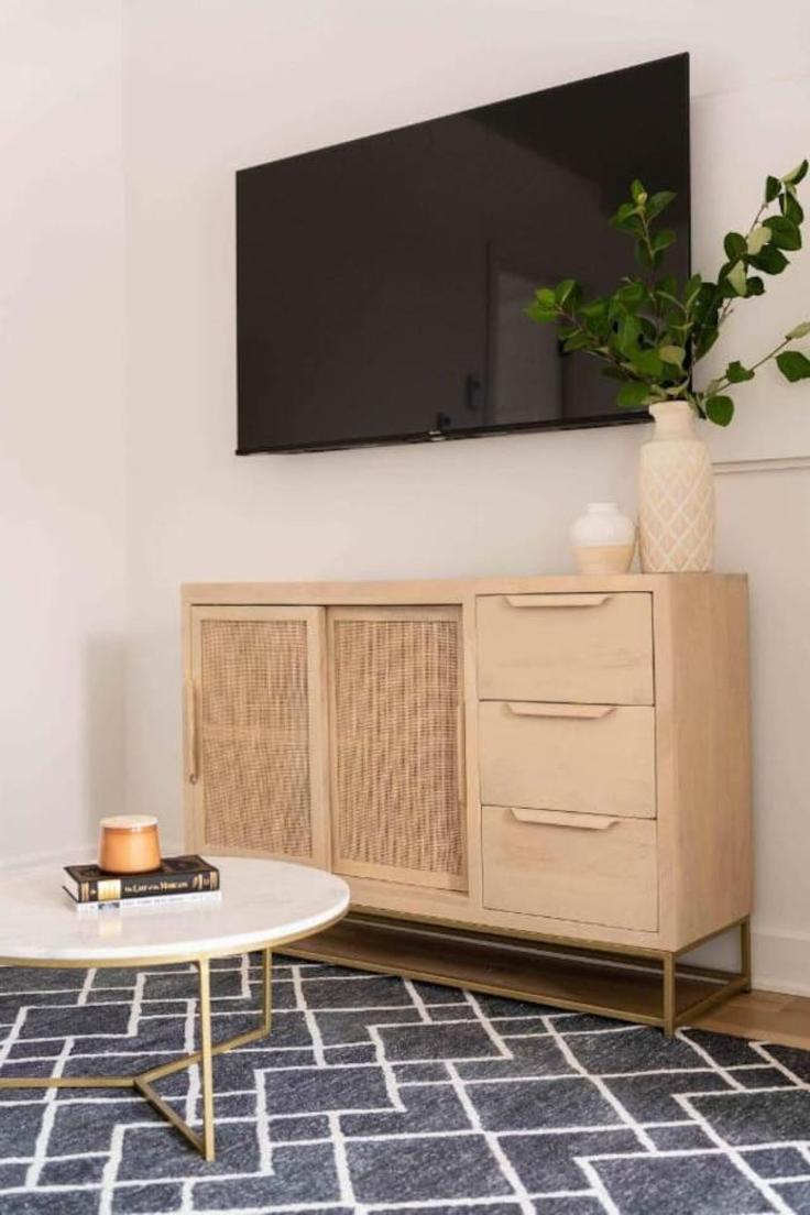 Elegante sala de estar con mobiliario moderno en un apartamento en Building Rue Notre-Dame Ouest - 9547-9267-quebec-inc - 1601920 en Southwest, Montreal
