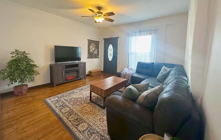 Elegantly designed living room with modern furnishings in an apartment at Building Pierre Street - a-b-properties - 1594724 in Manhattan, Manhattan