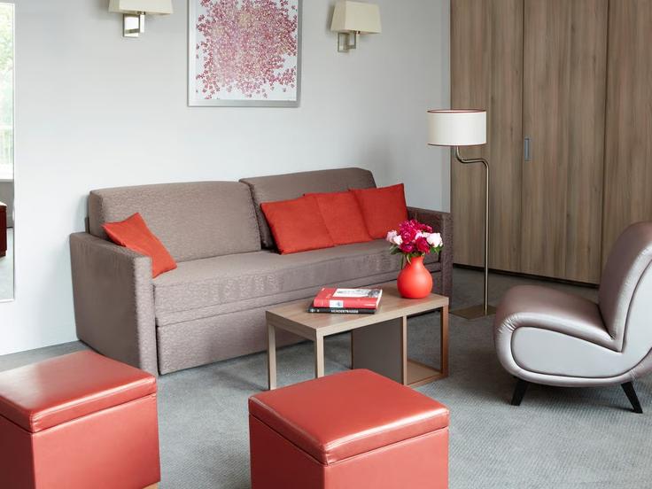 Salle de séjour élégante avec mobilier moderne dans un appartement à Building Uraniastraße - adagio - 1583766 à Vienna, Vienna Salle de séjour élégante avec mobilier moderne dans un appartement à Building Uraniastraße - adagio - 1583766 à Vienna, Vienna