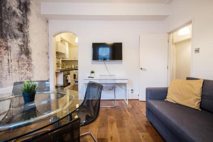 Sala de estar elegantemente projetada com móveis modernos em um apartamento no Building Oxford Street - advan-poperties - 1374792 em City of Westminster, London Sala de estar elegantemente projetada com móveis modernos em um apartamento no Building Oxford Street - advan-poperties - 1374792 em City of Westminster, London