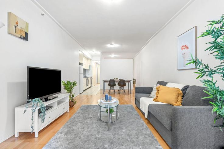 Elegante sala de estar con mobiliario moderno en un apartamento en Building Kent Street - advante-homes - 1520337 en Sydney, Sydney Elegante sala de estar con mobiliario moderno en un apartamento en Building Kent Street - advante-homes - 1520337 en Sydney, Sydney