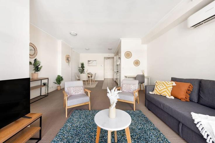 Elegant gestaltetes Wohnzimmer mit moderner Einrichtung in einer Wohnung im Building Kent Street - advante-homes - 1598542 in Sydney, Sydney Elegant gestaltetes Wohnzimmer mit moderner Einrichtung in einer Wohnung im Building Kent Street - advante-homes - 1598542 in Sydney, Sydney