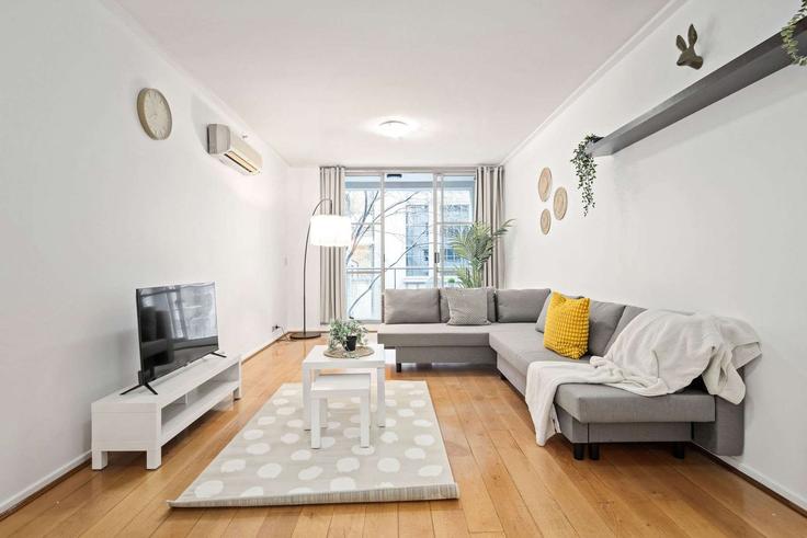 Elegante sala de estar con mobiliario moderno en un apartamento en Building Kent Street - advante-homes - 1520327 en Sydney, Sydney Elegante sala de estar con mobiliario moderno en un apartamento en Building Kent Street - advante-homes - 1520327 en Sydney, Sydney