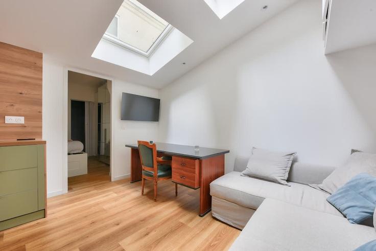 Sala de estar elegantemente projetada com móveis modernos em um apartamento no Building Rue du Commerce - airbnyou - 1380469 em 15th arrondissement, Paris Sala de estar elegantemente projetada com móveis modernos em um apartamento no Building Rue du Commerce - airbnyou - 1380469 em 15th arrondissement, Paris