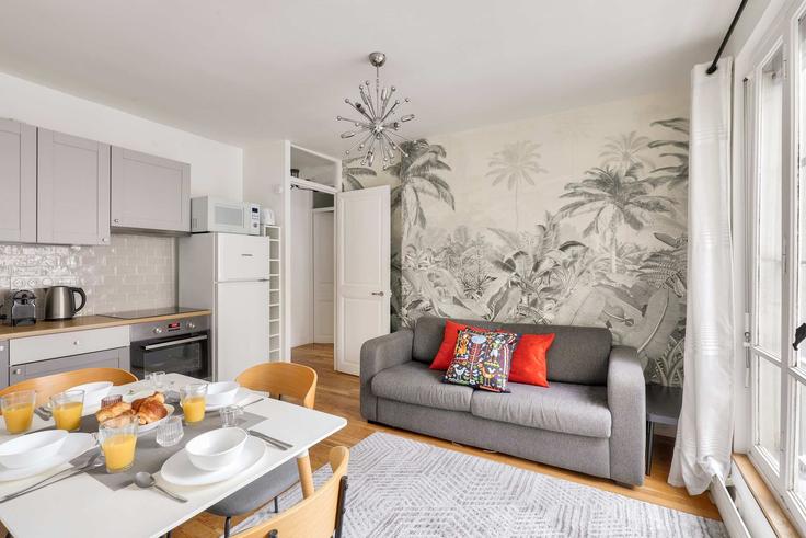 Paris 10th arrondissementのBuilding Rue de Paradis - airbnyou - 1068313 - PARのアパートメントにある、モダンな家具を備えたエレガントなデザインのリビングルーム