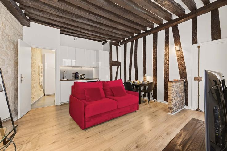 Sala de estar elegantemente projetada com móveis modernos em um apartamento no Building Rue Maître Albert - airbnyou - 1694935 em 5th arrondissement, Paris Sala de estar elegantemente projetada com móveis modernos em um apartamento no Building Rue Maître Albert - airbnyou - 1694935 em 5th arrondissement, Paris