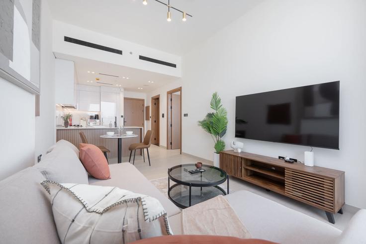 Salle de séjour élégante avec mobilier moderne dans un appartement à Building Binghatti Onyx - airdxb - 1066567 - DXB à Jumeirah Village, Dubai