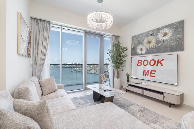 Elegant gestaltetes Wohnzimmer mit moderner Einrichtung in einer Wohnung im Building Canal Front 9A - airdxb - 1030685 in Al Wasl, Dubai