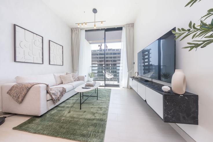 Elegant gestaltetes Wohnzimmer mit moderner Einrichtung in einer Wohnung im Building Binghatti Amber - airdxb - 1245210 - DXB in Jumeirah Village, Dubai Elegant gestaltetes Wohnzimmer mit moderner Einrichtung in einer Wohnung im Building Binghatti Amber - airdxb - 1245210 - DXB in Jumeirah Village, Dubai