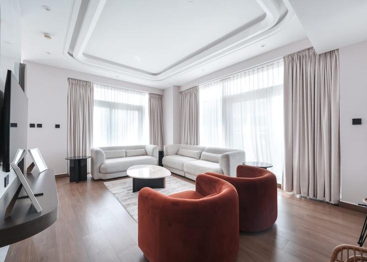 Elegantly designed living room with modern furnishings in an apartment at Building Sh Mohammed Bin Rashid Blvd - airdxb - 1324807 in Downtown Dubai, Dubai Elegantly designed living room with modern furnishings in an apartment at Building Sh Mohammed Bin Rashid Blvd - airdxb - 1324807 in Downtown Dubai, Dubai