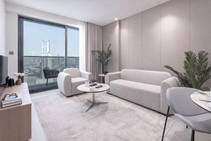 Dubai Al Barsha South FifthのBuilding Orchid St - airdxb - 1387175のアパートメントにある、モダンな家具を備えたエレガントなデザインのリビングルーム