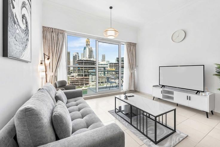 Elegante sala de estar con mobiliario moderno en un apartamento en Building Mayfair Tower - airdxb - 1475804 en Business Bay, Dubai Elegante sala de estar con mobiliario moderno en un apartamento en Building Mayfair Tower - airdxb - 1475804 en Business Bay, Dubai