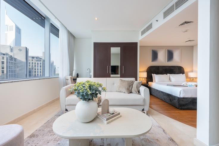 Building Sky Gardens - airdxb - 1030690 - DXB adresindeki bir dairede modern mobilyalarla zarif bir şekilde tasarlanmış oturma odası Trade Center, Dubai Building Sky Gardens - airdxb - 1030690 - DXB adresindeki bir dairede modern mobilyalarla zarif bir şekilde tasarlanmış oturma odası Trade Center, Dubai