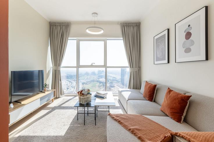 Sala de estar elegantemente projetada com móveis modernos em um apartamento no Building D54 - airstay-holiday-homes-llc-1 - 1525275 em Dubai, Dubai Sala de estar elegantemente projetada com móveis modernos em um apartamento no Building D54 - airstay-holiday-homes-llc-1 - 1525275 em Dubai, Dubai