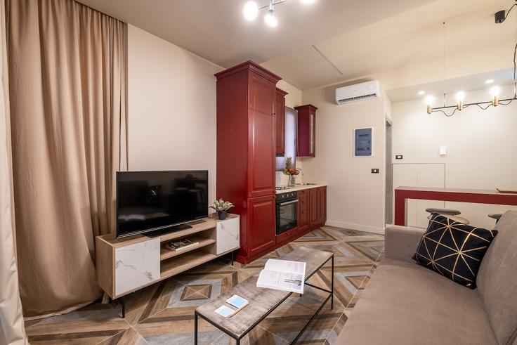 Elegant gestaltetes Wohnzimmer mit moderner Einrichtung in einer Wohnung im Building Solomou - albaresidences - 1055210 - ATH in Central Athens, Athens