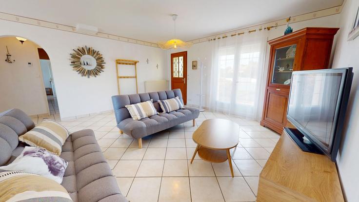 Salle de séjour élégante avec mobilier moderne dans un appartement à Building Rue des Semailles - allo-vende-vacances - 1437759 à Givrand, Givrand