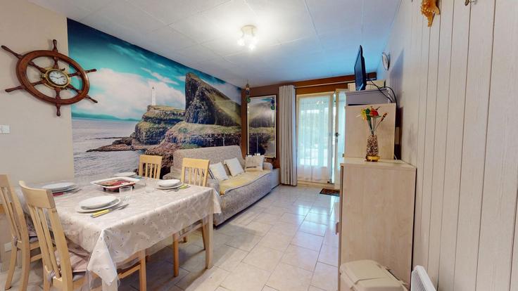 Building Avenue de l'Albatros - allo-vende-vacances - 1462275 adresindeki bir dairede modern mobilyalarla zarif bir şekilde tasarlanmış oturma odası Saint-Hilaire-de-Riez, Saint-Hilaire-de-Riez