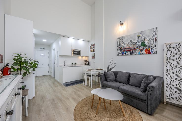 Elegant gestaltetes Wohnzimmer mit moderner Einrichtung in einer Wohnung im Building Calle Laguna del Marquesado - almazan-real-estate-slu - 1071686 - MAD in Villaverde, Madrid Elegant gestaltetes Wohnzimmer mit moderner Einrichtung in einer Wohnung im Building Calle Laguna del Marquesado - almazan-real-estate-slu - 1071686 - MAD in Villaverde, Madrid