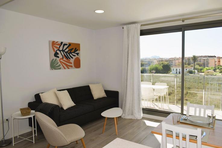 Dénia, Dénia에 위치한 Building Carrer de Castor - anacasa-inmobiliaria - 1345046 아파트의 세련된 인테리어가 돋보이는 거실 Dénia, Dénia에 위치한 Building Carrer de Castor - anacasa-inmobiliaria - 1345046 아파트의 세련된 인테리어가 돋보이는 거실