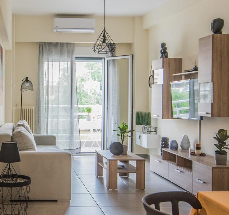 Salle de séjour élégante avec mobilier moderne dans un appartement à Building Παναγή Τσαλδάρη - andie-wings - 1603959 à South Athens, Athens Salle de séjour élégante avec mobilier moderne dans un appartement à Building Παναγή Τσαλδάρη - andie-wings - 1603959 à South Athens, Athens