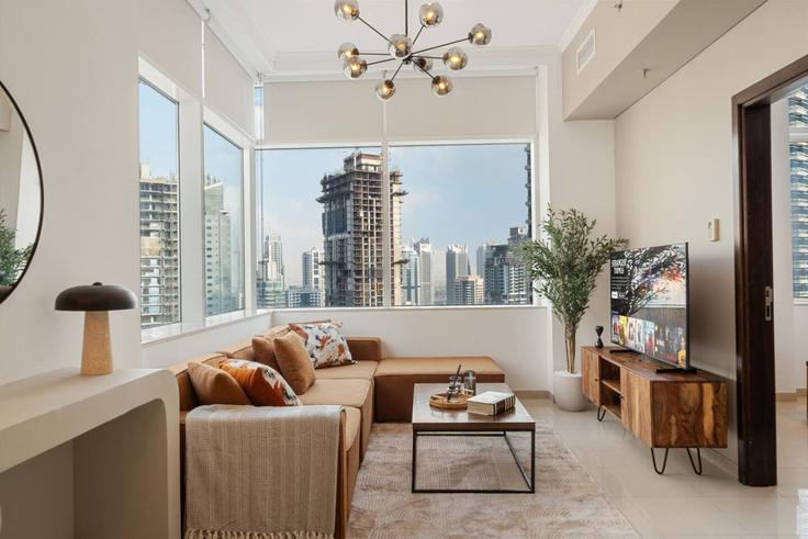 Salle de séjour élégante avec mobilier moderne dans un appartement à Building Botanica Tower - anfa-vacation-homes-rental-llc - 1643542 à Dubai Marina, Dubai Salle de séjour élégante avec mobilier moderne dans un appartement à Building Botanica Tower - anfa-vacation-homes-rental-llc - 1643542 à Dubai Marina, Dubai