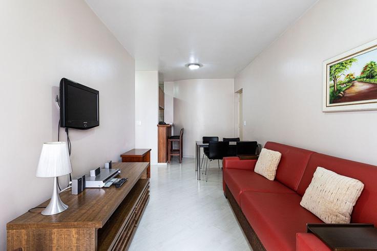 Elegante sala de estar con mobiliario moderno en un apartamento en Building Alameda Jaú - anfitriao-prime - 1365324 en Jardim Paulista, São Paulo