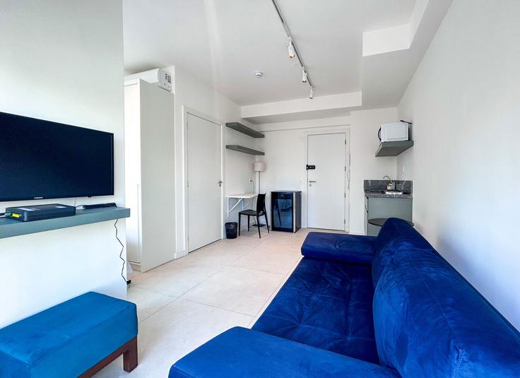 Salle de séjour élégante avec mobilier moderne dans un appartement à Building Avenida Santo Amaro - anfitriao-prime - 1365330 à Vila Olímpia, São Paulo Salle de séjour élégante avec mobilier moderne dans un appartement à Building Avenida Santo Amaro - anfitriao-prime - 1365330 à Vila Olímpia, São Paulo