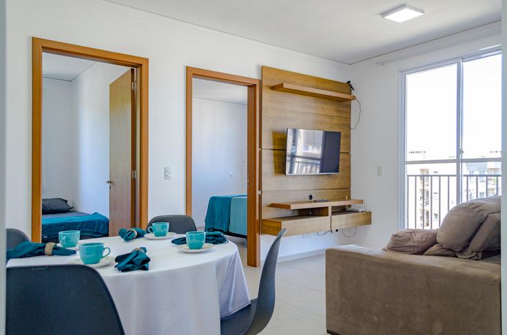Salle de séjour élégante avec mobilier moderne dans un appartement à Building Estrada Anarolina Silveira Santos - anfitriao-prime - 1365392 à Vargem do Bom Jesus, Florianópolis Salle de séjour élégante avec mobilier moderne dans un appartement à Building Estrada Anarolina Silveira Santos - anfitriao-prime - 1365392 à Vargem do Bom Jesus, Florianópolis