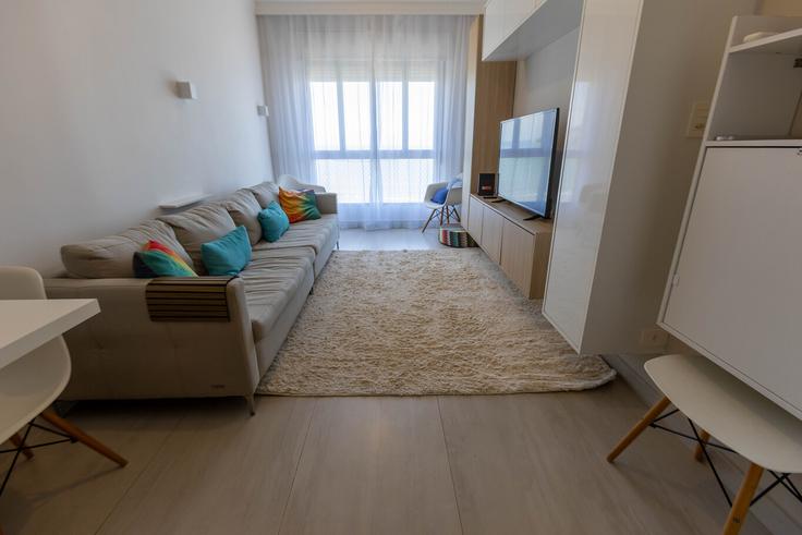 Salle de séjour élégante avec mobilier moderne dans un appartement à Building Avenida Bartholomeu de Gusmão - anfitriao-prime - 1365511 à Aparecida, Santos Salle de séjour élégante avec mobilier moderne dans un appartement à Building Avenida Bartholomeu de Gusmão - anfitriao-prime - 1365511 à Aparecida, Santos