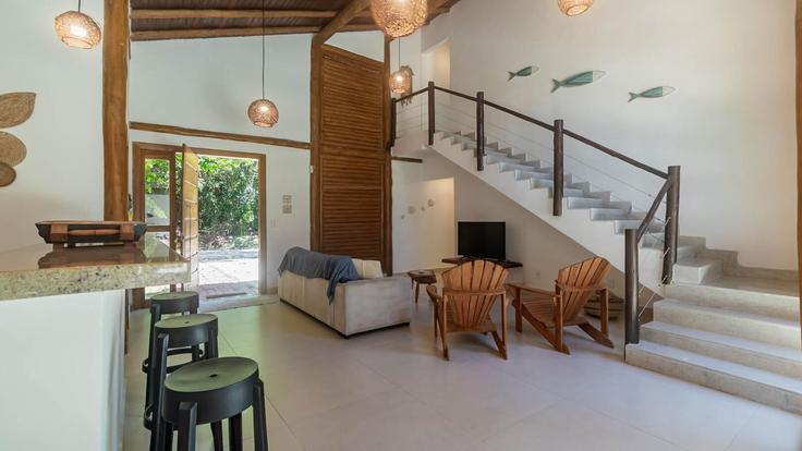 Salle de séjour élégante avec mobilier moderne dans un appartement à Building Rua Duarte Coelho - anfitriao-prime - 1365620 à Bairro Paraguai, Porto Seguro Salle de séjour élégante avec mobilier moderne dans un appartement à Building Rua Duarte Coelho - anfitriao-prime - 1365620 à Bairro Paraguai, Porto Seguro