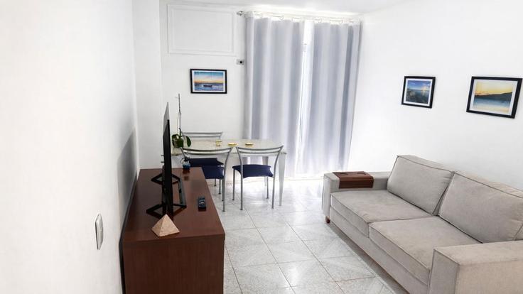 Elegante sala de estar con mobiliario moderno en un apartamento en Building Rua Sylvio da Rocha Pollis - anfitriao-prime - 1389016 en Barra da Tijuca, Rio de Janeiro
