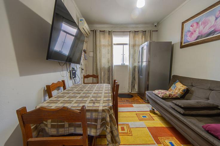 Elegante sala de estar con mobiliario moderno en un apartamento en Building Rua Joaquim Távora - anfitriao-prime - 1458903 en Vila Matias, Santos Elegante sala de estar con mobiliario moderno en un apartamento en Building Rua Joaquim Távora - anfitriao-prime - 1458903 en Vila Matias, Santos