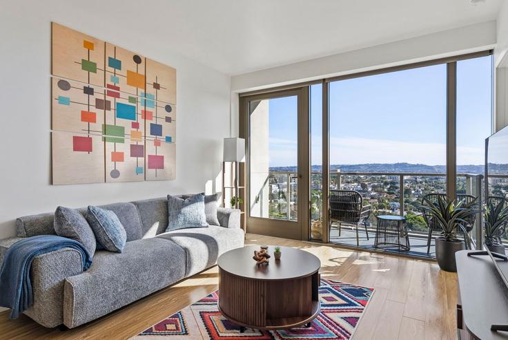 Salle de séjour élégante avec mobilier moderne dans un appartement à Building Wilshire Boulevard - anyplaceru - 1491069 à Los Angeles, Los Angeles Salle de séjour élégante avec mobilier moderne dans un appartement à Building Wilshire Boulevard - anyplaceru - 1491069 à Los Angeles, Los Angeles