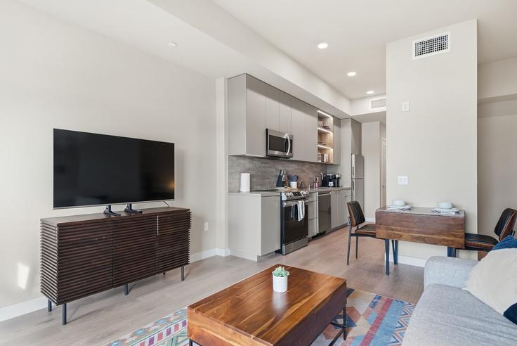 Los Angeles Los AngelesのBuilding North Fairfax Avenue - anyplaceru - 1624500のアパートメントにある、モダンな家具を備えたエレガントなデザインのリビングルーム