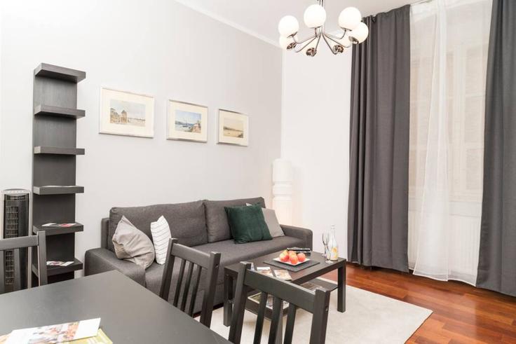 Elegant gestaltetes Wohnzimmer mit moderner Einrichtung in einer Wohnung im Building Schulerstraße - arbiogroup - 1046193 in Vienna, Vienna Elegant gestaltetes Wohnzimmer mit moderner Einrichtung in einer Wohnung im Building Schulerstraße - arbiogroup - 1046193 in Vienna, Vienna