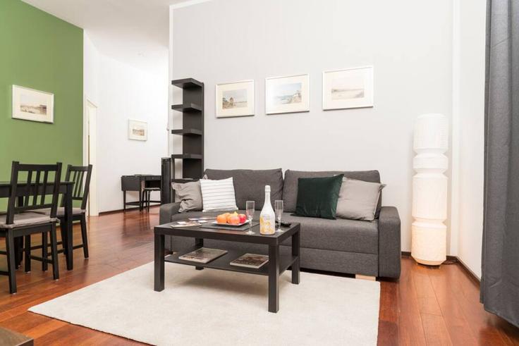 Salle de séjour élégante avec mobilier moderne dans un appartement à Building Schulerstraße - arbiogroup - 1046193 à Vienna, Vienna