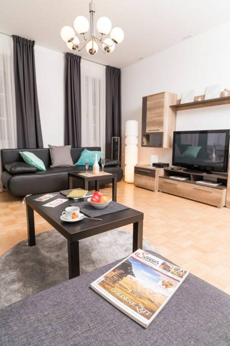 Vienna ViennaのBuilding Schulerstraße - arbiogroup - 1046196 - VIEのアパートメントにある、モダンな家具を備えたエレガントなデザインのリビングルーム Vienna ViennaのBuilding Schulerstraße - arbiogroup - 1046196 - VIEのアパートメントにある、モダンな家具を備えたエレガントなデザインのリビングルーム