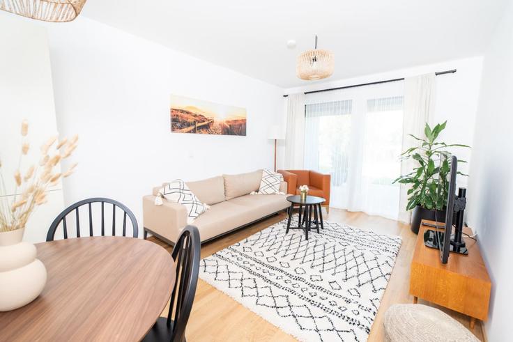 Elegant gestaltetes Wohnzimmer mit moderner Einrichtung in einer Wohnung im Building Erzherzog-Karl-Straße - arbiogroup - 1046436 in Vienna, Vienna Elegant gestaltetes Wohnzimmer mit moderner Einrichtung in einer Wohnung im Building Erzherzog-Karl-Straße - arbiogroup - 1046436 in Vienna, Vienna