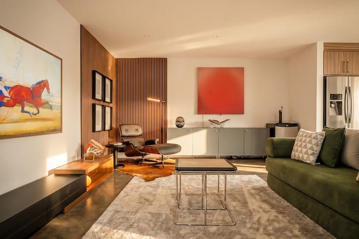Elegante sala de estar con mobiliario moderno en un apartamento en Building 3 Avenue Northeast - argo - 1634060 en Crossroads, Calgary Elegante sala de estar con mobiliario moderno en un apartamento en Building 3 Avenue Northeast - argo - 1634060 en Crossroads, Calgary