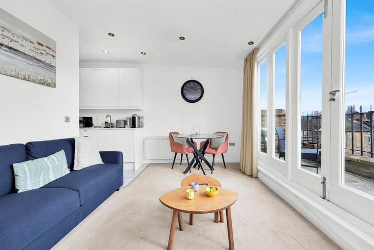Elegante sala de estar con mobiliario moderno en un apartamento en Building Hanbury Street - arhouse-management - 1593483 en London Borough of Tower Hamlets, London Elegante sala de estar con mobiliario moderno en un apartamento en Building Hanbury Street - arhouse-management - 1593483 en London Borough of Tower Hamlets, London