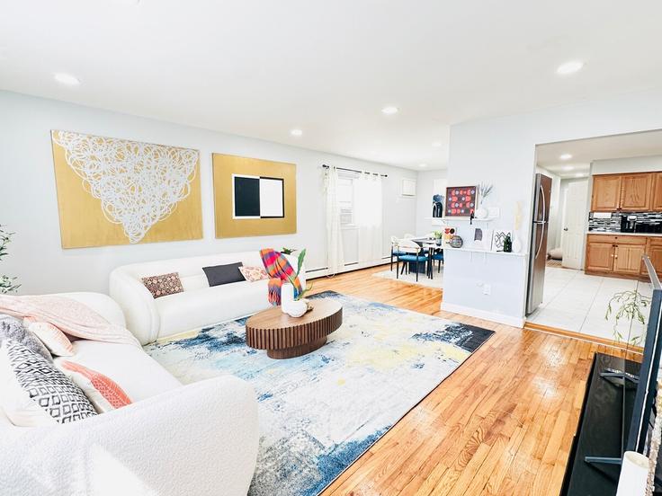 Jersey City Jersey CityのBuilding Terrace Avenue - atlier-living-homes - 1630800のアパートメントにある、モダンな家具を備えたエレガントなデザインのリビングルーム