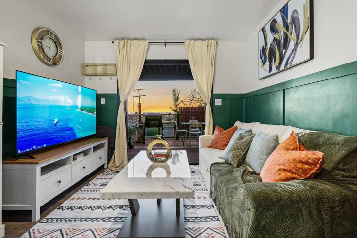 Elegantly designed living room with modern furnishings in an apartment at Building Churchward Street - avary-properties-llc - 1283130 - SAN in San Diego, San Diego