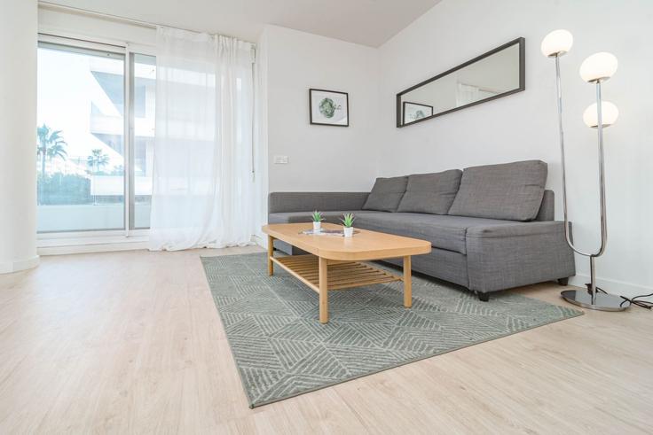 Elegant gestaltetes Wohnzimmer mit moderner Einrichtung in einer Wohnung im Building Calle Miguel Delibes - b06855001 - 1343450 in Nueva Andalucía, Marbella Elegant gestaltetes Wohnzimmer mit moderner Einrichtung in einer Wohnung im Building Calle Miguel Delibes - b06855001 - 1343450 in Nueva Andalucía, Marbella
